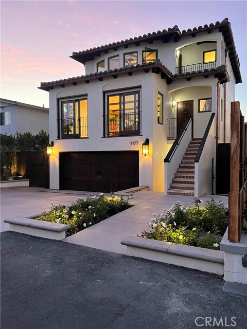 One of a kind custom Beach Estate located on a private cul-de-sac in the much coveted “Lanes” of Ventura. Walking distance from the Harbor, Marina, Restaurants, shopping, parks, fishing, biking, hiking all while located on your own private street (no public parking allowed) with exclusive private beach access. Steps from the sand, a Spanish style 4 bed/4 1/2 bath oasis awaits you. Approx 3,200 sqft of unparalleled quality craftsmanship. This property can NOT be duplicated; it is a must see. The main level highlights include, but not limited to, full sized custom elevator, gourmet kitchen on main level, 2 sinks, wolf, sub-zero and Fisher paykel, water stone faucets, casement, sliding doors that are not “mass produced" and hung with hardware that is top notch, lighting from Belgium, hand rubbed custom cabinetry, more modern features like travertine, copper rain gutters and drainage to tankless water heaters, zoned air conditioning (in EVERY ROOM), custom closet installation, hand-picked fixtures/faucets/mirrors; top of the line smart home features, automation, cameras, keyless entry, fire & sprinkler systems, Sonos sound system, gas lines in back for fire pit/grill already done, water features, E-pay fencing enclosing the property, front pre-wired for electric fencing. Move on to more uniqueness with one-of-a-kind hand painted tiles and the thoughtfully designed convenience of a completely built smart home. Multiple grand entrances with captivating details throughout. Top of the line EVERYTHING and maximized usage of space. This undeniably modernized home oozes luxury while still maintaining the laid-back coast lifestyle. There are 2 separate entrances, 2 master suites (the grand master suite on 3rd floor has majestic ocean and Mountain Views with a separate sitting area. On every level there is a wine and coffee bar and laundry (laundry also in attached 2 car garage, making a total of 4 laundry areas). The elevator, from the ground floor to the grand master on 3rd level, can be stopped at the 2nd floor. Lower level with its own private entrance, full kitchen amenities, 2 bedrooms (one an on-suite) with access to the rear grounds and outdoor shower area. Gated side yards (one with keyless entry; again, for guest accommodation). The 2nd level opens to breathtaking entertainer’s delight with stone archways and balconies framing endless views while allowing in the ocean breeze. Don’t call it a “summer vacation” anymore; this needs to be home.