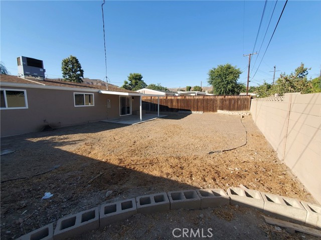 Large backyard with plenty of room to add a pool.