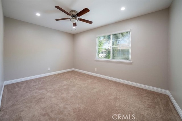 Upstairs fourth Bedroom upgraded ceiling fan & recessed lights, plush carpet