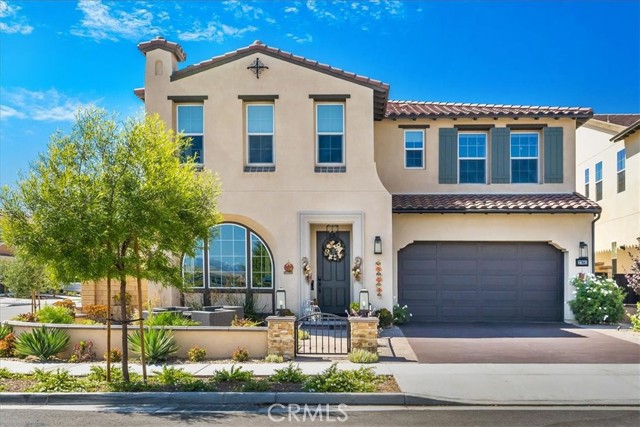 27681 Turnleaf Court Saugus, California LUXURIOUS RESORT STYLE POOL HOME situated on a cul-de-sac in the highly sought-after gated community “The Heights” at Five Knolls. This 4 bedroom, 3.5 bath w/ spacious loft dream home boasts immaculate interior which includes: high ceilings, wood plank tile flooring, downstairs suite, large covered deck, recessed lighting throughout, three-bay garage, electrical vehicle charging outlet, 10KVA solar sun power system, tankless water heater, and spacious built-in closets. As you enter this stunning home, there is a beautiful and spacious living room w/ gorgeous designer paint, window treatments, a stack stone decorative wall, and a large downstairs suite w/ full bath, perfect for guests. Chef’s dream kitchen offers a gas range with 6 burners, a gas oven, an additional built-in wall oven, a large granite center island, custom backsplash, a butler’s walk-in pantry, and a built-in wine fridge. The large cozy family room with a floor-to-ceiling fireplace feature, as well as beautiful window treatments, leads to an entertainer’s resort dream backyard. Features include a resort-style pool with 4 waterfalls and 3 fire features, a granite bar (room for 8), pop-up TV, high-end stainless-steel appliances, built-in bbq, Traeger smoker, refrigerator, Sunbrella curtains, and beautiful stack stone throughout. The upstairs features a great loft, two extra-large bedrooms, a beautiful master suite w/ a spacious balcony, and a floor to ceiling fireplace feature wall. The Master bathroom offers Italian floors and bath tile with his and hers custom walk-in closets, dual sinks, luxurious soaking tub, and upgraded walk-in shower. The Clubhouse features a pool, spa, fire pit, TVs, and is close to Golden Valley Park w/ playground and dog park. This gorgeous and model-perfect home will stun you with its dazzling interior finishes. MUST SEE!!!