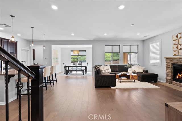 open floor plan with natural light and hillside views