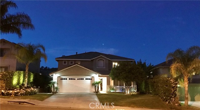 32688 The Old Road Castaic, California Stunning view home in the highly desirable Double C Ranch community. No HOA or Mello Roos. Turnkey and ready for you to make it your home! This bright and open floor plan offers plenty of space inside and out. Nicely upgraded home includes crown molding & custom-made plantation shutters throughout, recessed lighting with dimmers, travertine tile, hardwood & carpet floors. A huge remodeled kitchen comes with custom stone countertops, a large center island, and plenty of cabinet space. A lovely and spacious family room comes with a built-in entertainment center, surround sound, built-in dry bar, and cozy gas fireplace with nice big mantel. The large master bedroom includes an upgraded bathroom with dual sinks, a glass shower with a separate bathtub, and mirrored walk-in closet. Ceiling fans in almost every room. The kitchens sliding glass door leads to a nicely landscaped backyard, large covered patio, storage shed, built-in gas BBQ, relaxing firepit, and fantastic view. No rear neighbors. Close to the beautiful Castaic Lake, Aquatic Center, and more! True pride of ownership home! Hurry don't miss this great opportunity.