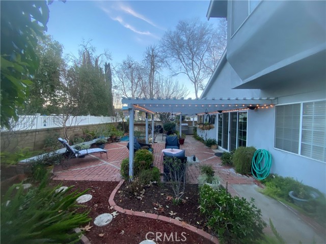 Manicured backyard with drip irrigation system