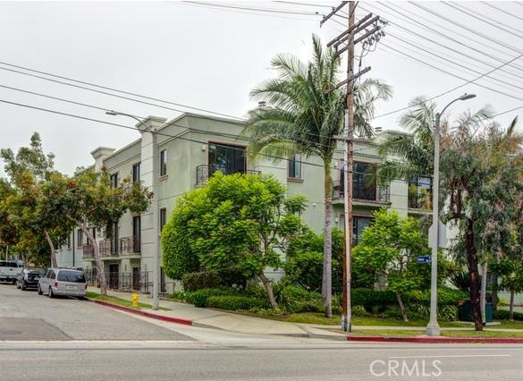16000 W Sunset Boulevard 105 Pacific Palisades, California SIGNIFICANT PRICE REDUCTION! SELLER WANTS IT SOLD!
"The Village", Hiking Trails, Farmers & Gelson's Markets, Pacific Palisades Charter School and of course THE OCEAN - all that is just steps from this elegant 13-Unit 3-Story complex in the very heart of Pacific Palisades. The unit is situated in the back of the building, away from the fumes and noise of busy Sunset Blvd. It is spacious, bright and airy with high ceilings and sensible floor plan. Remodeled and tastefully appointment 1st floor condo has recessed lighting throughout, Hardwood floors in both bedrooms. Master Suite has big bathroom and spacious walk-in closet. Travertine Tile floors in the living room & large dining area warmed up by soothing fireplace. Open kitchen w/stainless steel appliances, range, dishwasher, granite counters & backsplash and Bamboo cabinets. Direct access to the outdoor patio that only few units in the building have. 2 designated side-by-side spaces in subterranean parking structure that also has 6 dedicated guest parking spaces. Seller might carry!