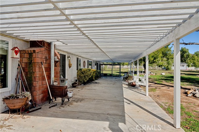 patio off family room with antique fireplace