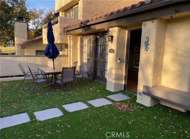 Front patio features easy care turf.