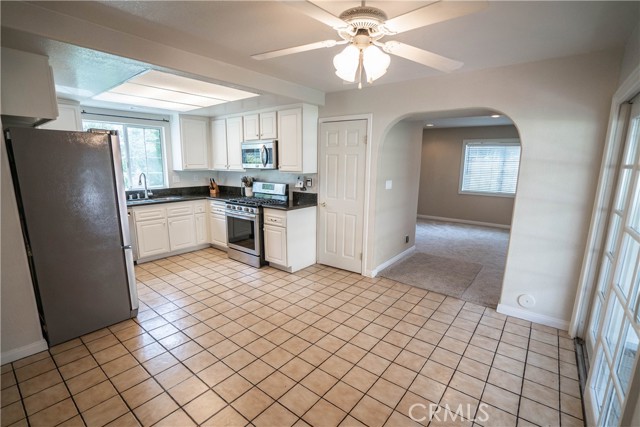 Kitchen with entrance to family room