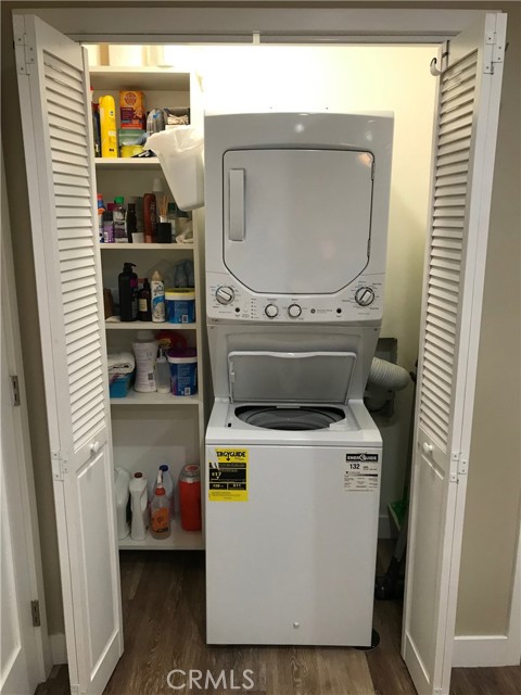 Stackable washer & dryer in laundry room closet