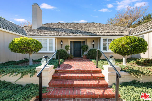 A unique opportunity to live on one of the most prime streets in Los Angeles! This lovely single-story home is set back from the street and is situated on just over a 1/2 acre lot on one of the most sought-after streets in Brentwood Park. For those looking for a sports court property, this one has an enclosed paddle tennis court surrounded by greenery and hedges which gives ultimate privacy. It has close proximity to shopping, coffee, restaurants, Country Mart and more. Just minutes from Brentwood Farmer's Market on Sundays and the beach. This home is also in one of the best school districts in LA and very close to many incredible private schools.