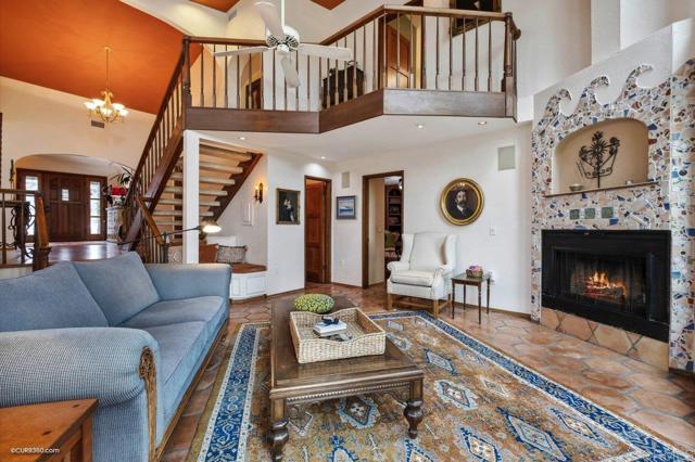 Living room complete with cozy fireplace for warmth and ambiance