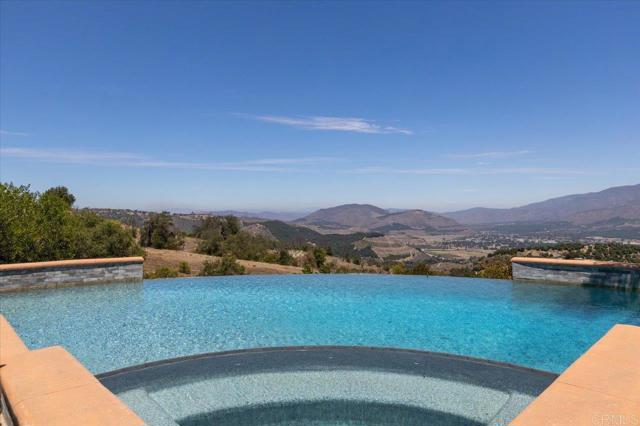 31662 Orange Blossom Ct, Valley Center CA: https://media.crmls.org/mediaz/007990af-ebb3-45b8-b9fe-70cfc6d1362f.jpg