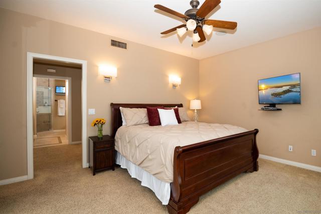 Double sliding door closets (both sides) on your way to your master bath with soaking tub, stall shower, double sinks and water closet.
