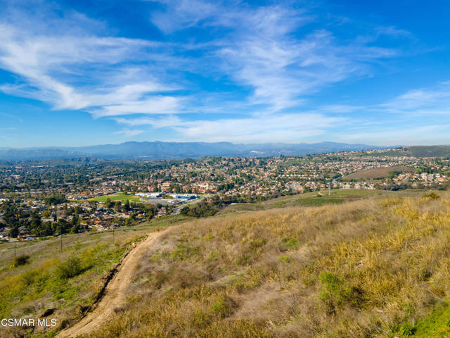 Welcome to Sky Ranch, where boundless opportunity awaits atop this majestic 37+ acre hilltop parcel. Experience the epitome of exclusivity while taking in the breathtaking views that stretch to the horizon in every direction of the Conejo and adjacent valleys.  With each sunrise and sunset painting the sky above the Santa Monica & Santa Susana Mountain ranges in vivid hues, every moment spent on this land becomes a masterpiece in the making. Directly adjacent to protected recreational open space and nestled in the heart of Thousand Oaks, this premier location offers the perfect balance of seclusion and accessibility. Enjoy the convenience of easily accessible top-tier schools, shopping destinations, restaurants, farmers' markets, and a multitude of picturesque hiking and biking trails within reach of your own backyard.  Just moments away from Westlake Village, a wealth of additional options awaits at your fingertips, including upscale boutiques, restaurants, entertainment, and country club options.This tranquil escape from the hustle and bustle of city life provides amazing and unlimited potential. Developers and families alike are invited to explore the endless possibilities, from subdividing and constructing multiple estates to creating an exclusive gated community, crafting residences suitable for a multi-generational family, or an expansive private retreat with its own vineyard, the opportunities are endless! Seize the opportunity to ascend to new heights of possibility on this remarkable parcel of land, where panoramic views command attention and inspire awe.All visual home depictions are artist conceptions only and do not represent a final home or land use approved for development on this property. Buyers should rely on his or her own evaluation of usable area and suitability. Please consult our sales team for more detailed information and specifics.  All prices presented, terms are effective date of publication and may change without notice.