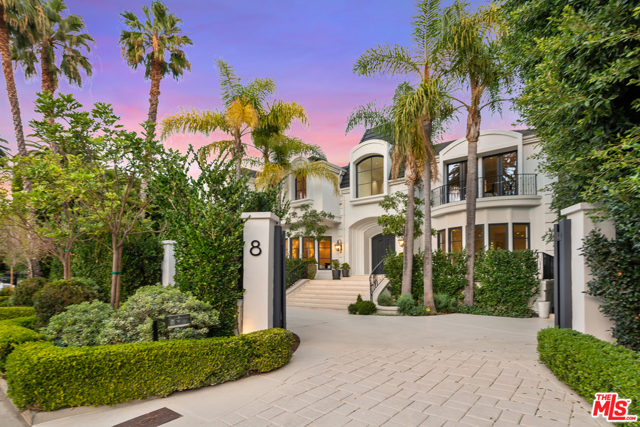 8 Oakmont Drive Los Angeles, California THE BEST DEAL IN BRENTWOOD PARK PRICE PER SQUARE FOOT! Built around the art of entertaining stands this magnificent trophy estate set on one of the most coveted, secure, and exclusive streets in Brentwood. Spanning over 11,300 sf and boasting oversized archways, grand-scale rooms, fireplaces, large picturesque windows & French doors that open to the park-like outdoor spaces. Gourmet kitchen w/ high-end appliances, 6-burner range, espresso machine, wine fridge, pantry, that flows to both the breakfast area & formal dining. Master wing w/ lounge, views, fireplace, wet-bar, walk-in closets & dual baths. Resort-like yard w/ pool, spa, lounge areas & meticulous landscaping. Other highlights include guest suites, wellness suite w/ sauna & gym, media room w/bar, wine cellar staff quarters, laundry room, elevator, 8 car garage & more. This gated and ultra-private luxury estate has been meticulously maintained and features some of the finest designer touches.