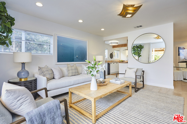 241 7Th Avenue Venice, California Don't miss this private and gated Contemporary Venice Bungalow located just a block north of Rose Avenue! Bright and light 3BR/3.BA home that exudes a warm and inviting atmosphere. Behind the gate & lush landscaping, enter into a serene setting and you are immediately captivated by an inviting, open floor plan complete with a spacious living /dining area plus a great room looking out to beautiful back yard. Gourmet kitchen with stainless appliances, island and breakfast bar. Sun-filled Master Suite with built-ins and French doors. Other features: Updated bathrooms, designer light fixtures, wood floors throughout, central heat/air & solar panels. Quiet and peaceful back yard complete with large deck, lush landscaping, outdoor shower, and several seating areas that make this a very magical and private-retreat style home. The ultimate in indoor/outdoor living. Amazing location close to Whole Foods, beach and all the hip restaurants and stores on Rose Avenue. Don't let this be the one that got away!