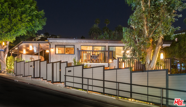 1310 LONDONDERRY Place Los Angeles, California Featured in Beverly Hills Lifestyle magazine, this architectural tour de force was completely remodeled to exquisite precision. Boasting views of the Century City skyline, this home is completely gated and nestled on a private street, and it is walking distance to the Sunset Plaza shops, cafes, and eateries. Custom furniture and commissioned works accentuate the home's open floor plan, soaring ceilings, and expansive outdoor decks. Control the home's lighting, climate, music, security system, cameras and more with your phone. Two-car parking. Stunningly crafted to meticulous detail, this property boasts unparalleled sophistication and addresses every desire for the most discerning occupant - truly a property unrivaled in all of Los Angeles.