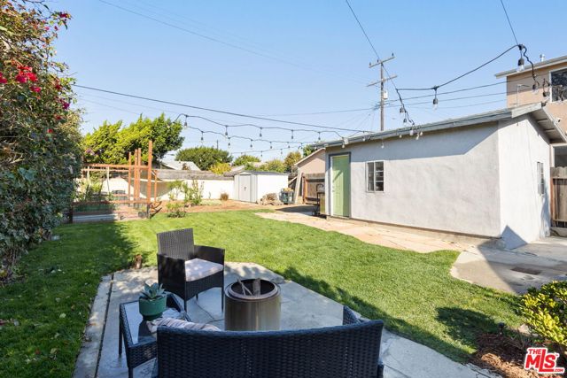 341 E 64th Street, Los Angeles CA: https://media.crmls.org/mediaz/0268a04b-f252-40ab-a8dd-6ad7a6963ff1.jpg