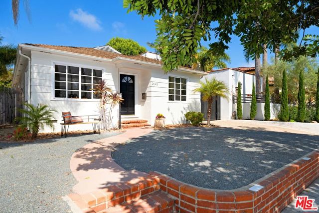 2643 33Rd Street Santa Monica, California Welcome home to this light and bright one story charming Traditional home in coveted Santa Monica on a nice large flat lot. The remodeled kitchen has granite counters, crisp white appliances, a large sink, lots of cabinet space, and an additional prep sink bonus area that could also be a great laundry room. The kitchen opens to an adorable breakfast room and a pop through opening to the dining area and living room. The primary bedroom with remodeled ensuite bathroom that has French doors that open to the large backyard plus two additional bedrooms that share a full bathroom. The garage has been converted into a bedroom and bathroom plus laundry room. This large lot offers a vegetable garden, sandbox, fire pit and multiple seating and dining areas to enjoy the California lifestyle. Do not miss this opportunity for a home that is perfect to move into now and can be easily added onto as your needs call for expansion.