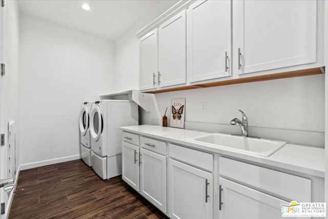 Large laundry room with sink