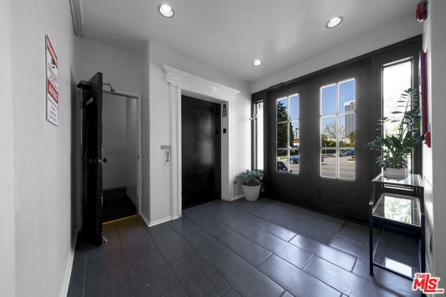 5848 W Olympic Boulevard, Los Angeles CA: https://media.crmls.org/mediaz/02bdd809-bba3-4830-a11a-cb208f7d6a94.jpg