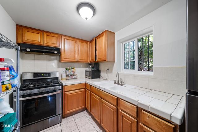 1449 1451 E 75th Street, Los Angeles CA: https://media.crmls.org/mediaz/02c65c9b-4cea-456a-9ae8-fdeb3937b656.jpg