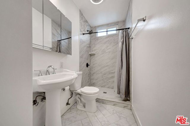 1216 N Kenmore Avenue, Los Angeles CA: https://media.crmls.org/mediaz/02ce3b3b-f121-4b15-b251-d5f511d5737d.jpg