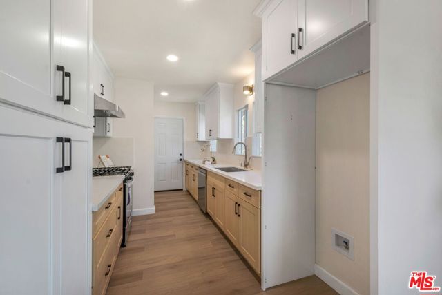 4933 W 20th Street, Los Angeles CA: https://media.crmls.org/mediaz/036b2312-609e-46b0-ad62-bc49c9e1507d.jpg