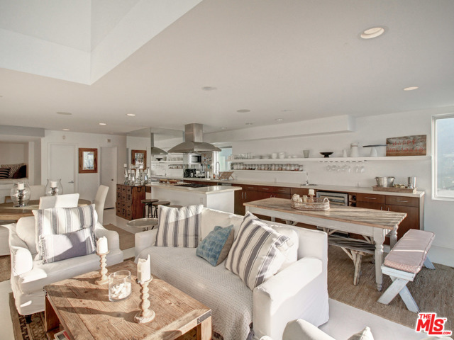 29 28Th Avenue 102 Venice, California This immaculate, Venice Beach town home is located on an iconic walk street, a block from world famous Venice Beach. At just over 2,000 square feet, the home has three bedrooms and three and a half baths, and feels like a sprawling single family home. Modern design, floor to ceiling glass doors, state of the art appliances, radiant floor heating, an outdoor shower and two parking spaces are just some of the luxuries that await you. The breathtaking roof-deck, with 360- degree ocean, mountain and panoramic city views completes this breathtaking property. This is California beach living at its finest!