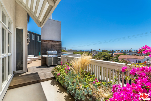 2115 3Rd Street 203 Santa Monica, California Step into a one of a kind, contemporary 3-story Santa Monica townhome with generous outdoor space on every level. Located just 3 blocks from the beach, this 2bd + loft, 3.5ba residence offers multiple environments for relaxed indoor/outdoor living. Enjoy al fresco dining on the outside patio off the gourmet kitchen & lounge areas, ending the day on the spacious roof deck, soaking in the sunset and views. The home features light and bright living spaces with dual sided-fireplace on the main floor, high ceilings and superb finishes throughout including Gaggenau & Sub-Zero appliances. You'll love the layout with two en-suite bedrooms on the lower floor and a 3rd story loft bedroom/office space with private entrance & its own full bathroom making it ideal for work from home. The primary suite features lush private patio, fireplace & gorgeous private bath. With proximity to Main St., beaches & amenities this home has everything for the quintessential Southern California lifestyle!