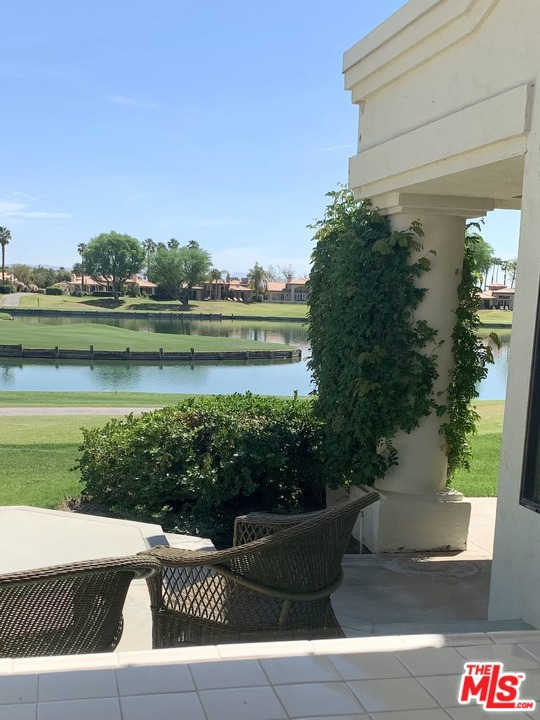 54350 Inverness Way La Quinta, California From the instant you enter the front door you will be mesmerized by the Incredible Shimmering Lake View! Overlooking the PC Stadium Course 6th hole drop zone and across the lake to the large penninsula green and on to the 7th Tee Box and Fairway. Private & quiet location, no golfballs here! These outstanding views are enjoyed not only from the entryway, kitchen, breakfast nook, wet bar and living room areas but also the Formal Dining Room. This 3 bedroom, 3 1/2 bath Legends 30 is mostly original and quite clean. The SS wall oven and microwave are only 2-3 years old, same with the carpet. Mostly furnished makes it easy to move-in and live, while contemplating future changes. Two car garage with utility sink and fairly new 50ga hot water tank. Features a golf cart garage also. The side yard is extra large, easily could handle the addition of a private pool & spa. The golf course facing patio is also extremely oversized.