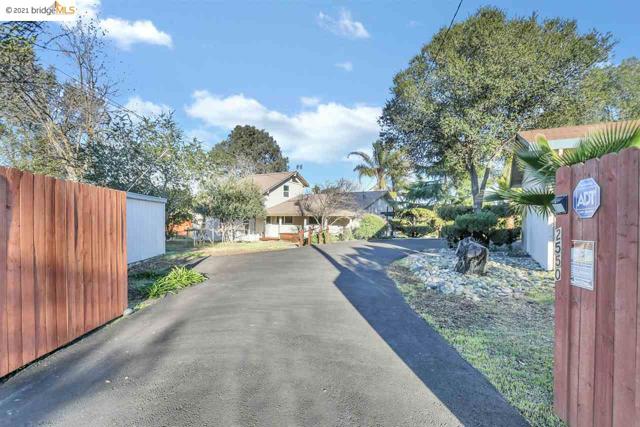 2550 Anderson Ln Brentwood, California A private piece of paradise yet in the middle of Brentwood. Automatic gated entry, with large mature trees set the landscape for this amazing property. Custom home, everything is on the main level, upstairs is a large loft area. This property has so many potential uses, almost half acre lot, fully fenced and private. There is an oversized detached garage/work shop, lots of room for rv and boat parking. The home is nicely laid out with a large family room and open kitchen. The time spent outside, entertaining your guest with a huge in ground pool and spa, or some quiet time gardening on your own property. Minutes to shopping and schools and highway 4.