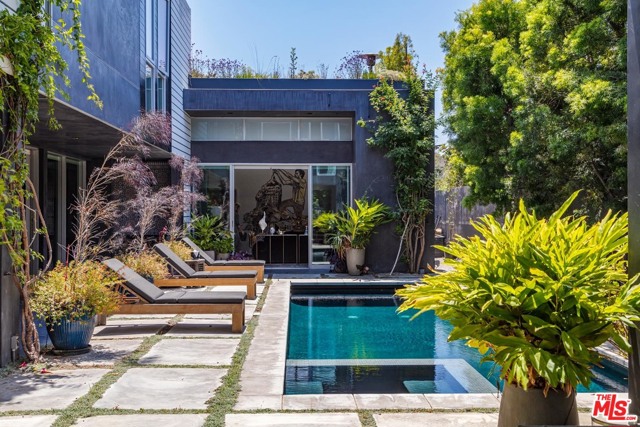 1365 Appleton Way Venice, California Welcome to 1365 Appleton Way, an Architectural masterpiece created by the award-winning design studio, Minarc. Enjoy the utmost elegance on an over 10,000 sqft lot. The main level has an incredible indoor/outdoor flow and is paired perfectly with a luxurious formal and informal living room, making for an ideal entertaining environment. The chef's kitchen is complete with Miele appliances, open dining room and floor to ceiling windows that lead to a pristine pool, Jacuzzi, large yard, detached studio and outdoor screening area. The upper level features 5 bedrooms, 3 full baths and a rooftop deck that overlooks the entire property. Striking yet intimate, this work-of-art is set behind gates with complete privacy and situated east of Lincoln in the heart of Venice.
