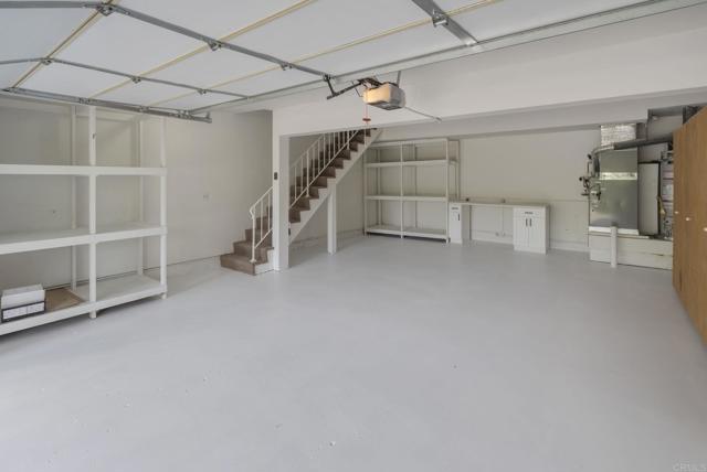Freshly painted flooring!  Under stair storage for addt'l items + holiday decorations!  Roomy!