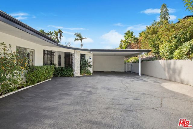9929 Anthony Place Beverly Hills, California An amazing opportunity to remodel or build your dream home on this Prime Benedict Canyon property. This is the first time this home is on the market, as the custom built mid-century property has had only one owner so far. The home offers excellent privacy as it is set back on a flag lot. The existing house has a great floor plan as is, with the original Terrazzo floors. Don't miss out!
