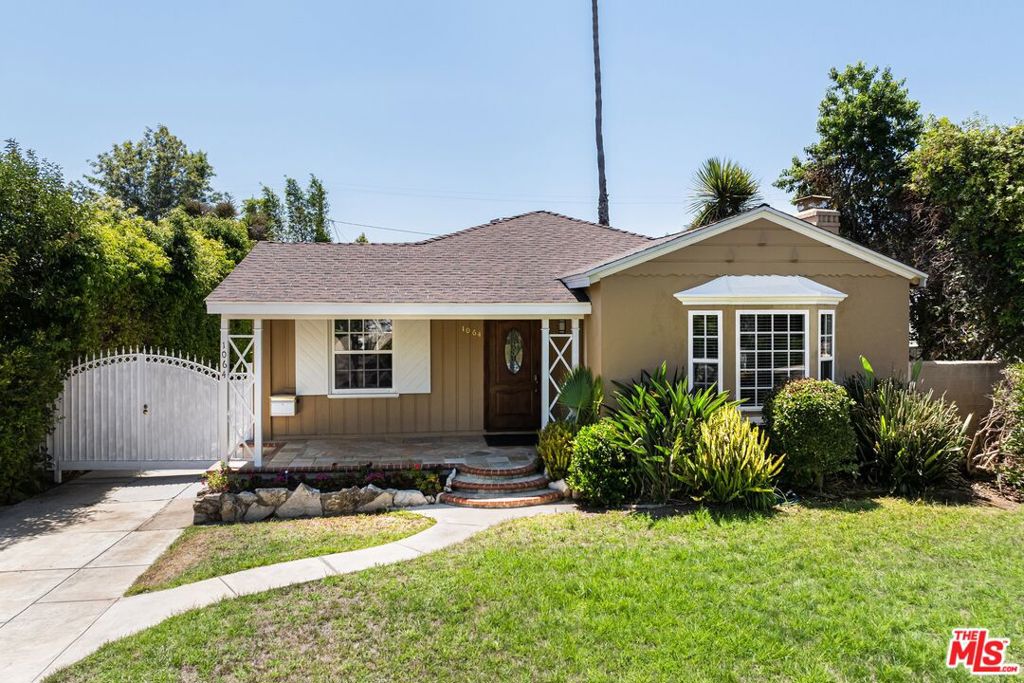 1064 Harvard Street Santa Monica, California This charming traditional home sited on a large lot, has been updated for a modern lifestyle while retaining many of the original details including wood floors and crown moldings. The gourmet kitchen, with a center island, stainless steel appliances, and granite countertops, has ample cabinets. Adjacent to the kitchen is a room currently used as an office, but also ideal as a playroom, or breakfast nook. The primary bedroom suite has a walk-in closet and a bathroom with separate tub/ shower, dual sinks. The formal dining room is a perfect place for entertaining during the holidays, or relaxing with friends. The living room features a fireplace and a bay window. Two additional bedrooms complete the floorplan for this special single level home. There is a two car detached garage, stackable laundry closet, and central A/C. Located in the Franklin School District and minutes away from Whole Foods and Erewhon. Take a break after a hectic day, and head to the beach or dinner on Montana Ave at one of the many restaurants. Enjoy all that Santa Monica has to offer.