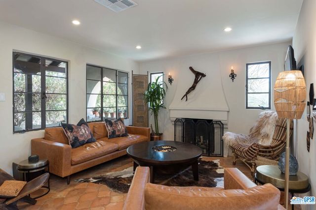 Another Fireplace Anchors the Living Room