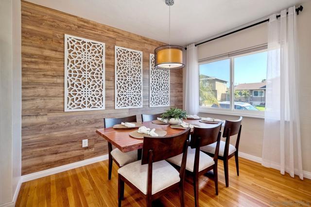 Beautiful Dining Room with Gorgous Wood Floors and Custom Wall!