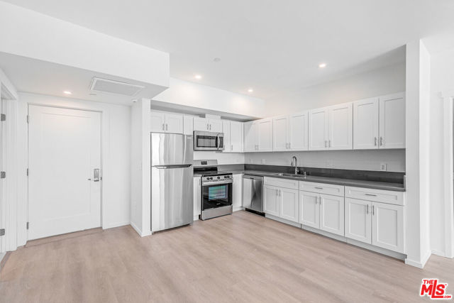 1227 N Berendo Street, Los Angeles CA: https://media.crmls.org/mediaz/0694d232-8cc3-41e6-8eae-c563b70ccccb.jpg