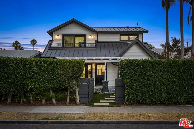 920 Superba Avenue Venice, California In the highly desirable Walk Street neighborhood in Venice, this Coastal-chic home has something for everyone. Behind the high hedge you're welcomed by an inviting front porch - the kind where you spend lazy Sunday afternoons sipping iced tea and reading the Times. Just inside, the chef's kitchen has high end appliances (Wolf, Sub-Zero, etc.) and custom cabinetry with room to store ALL the gadgets. With multiple seating areas, you can cozy up to the fireplace or enjoy the flow onto the back deck with room for more lounging or outdoor dining. Also opening onto the deck is the convertible 4th bedroom, perfect for a home gym or office if you'd prefer. Upstairs, all three bedrooms have en-suite baths awash in custom marble tiling. Two more outdoor patios maximize enjoyment of our perfect SoCal weather. A generously sized upstairs laundry room and attached 2-car garage allow for all kinds of extra storage, and there's parking for 2 more behind the house. There's definite curb appeal with the new black framed doors and windows, the standing seam metal roof & mature landscaping, and the location can't be beat as you're so close to the shops & dining on Abbot Kinney and Lincoln, and only a mile to the beach!