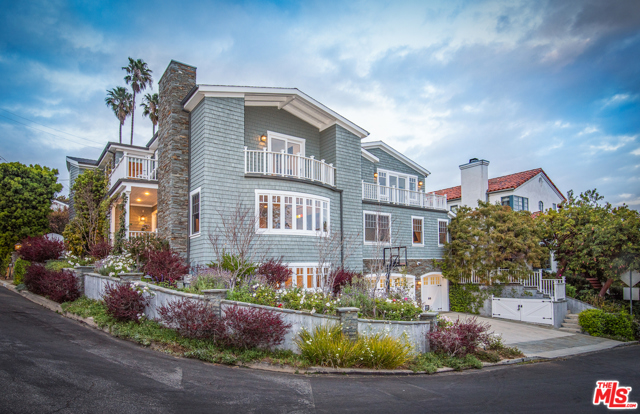 1202 Rimmer Avenue Pacific Palisades, California Located in the heart of Pacific Palisades, this stunning traditional-style home has incredible ocean views and sits right above the Palisades Village, just blocks from the best shopping, dinning and entertainment the city has to offer. This meticulously well-kept custom home has beautiful designer fixtures and details throughout, offering six large bedrooms and seven bathrooms. With impressive volume and double height ceilings the main floor features a formal living room, family room that opens to the chefs kitchen with high-end Miele appliances, dinning room, office and a second master guest suite. The open floor plan leads directly to the expansive, beautiful backyard, great for entertaining with pool and spa. Upstairs features five bedrooms including the master retreat where you can enjoy incredible Catalina Island views from your bed and private balcony. On the lower level, you will find a spacious entertainment room and a controlled temperature wine cellar. A 3-car garage with Blink system charger, intercom system, three wood burning fireplaces and Sonos system complete this offering. This is truly a special property.