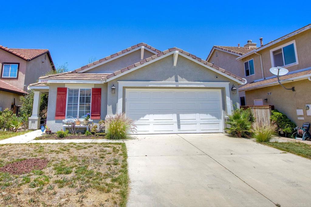 Welcome to this inviting 3-bedroom, 2-bathroom home located on a quiet cul-de-sac in one of Temecula’s most desirable neighborhoods. Inside, you'll find a spacious layout featuring a large primary suite with a walk-in closet, dual sinks, and vaulted ceilings.The home offers both a comfortable living room and a separate family room with a cozy gas fireplace—perfect for relaxing or entertaining. The open kitchen includes wood cabinetry, a center island, breakfast bar, ceramic tile flooring, and a quaint breakfast nook with French doors that open to the backyard. Interior highlights include hand-scraped maple wood flooring, plantation shutters, dual-pane windows, and an indoor laundry room. A 2-car attached garage provides direct access for added convenience. Enjoy the private backyard with a covered patio—great for outdoor gatherings or quiet mornings. This charming home offers comfort, functionality, and a fantastic location.