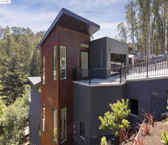 Rear view of property featuring a balcony