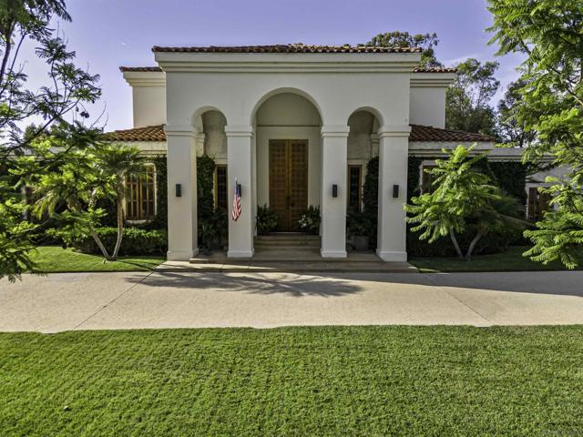 Sweeping semi- circular driveway affords door affords front door service to guests