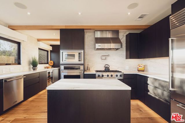 Drew Fenton | 1235 N Kenter Avenue Los Angeles CA | MLS: 7439365