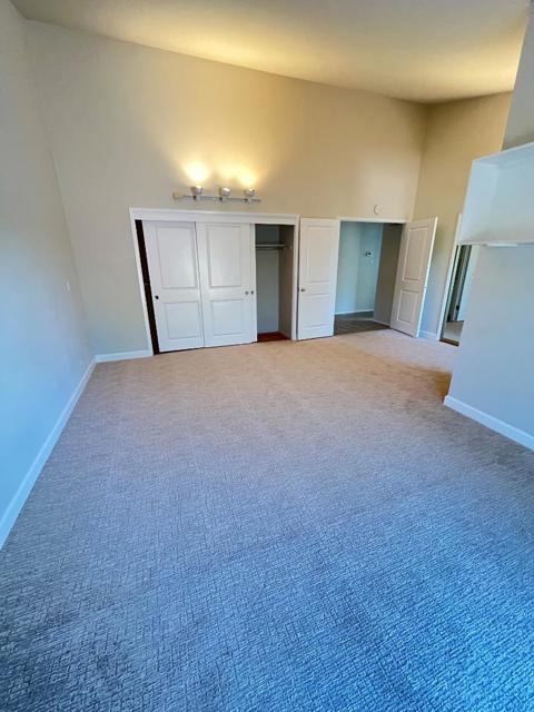 Primary suite viewed from sliding glass door