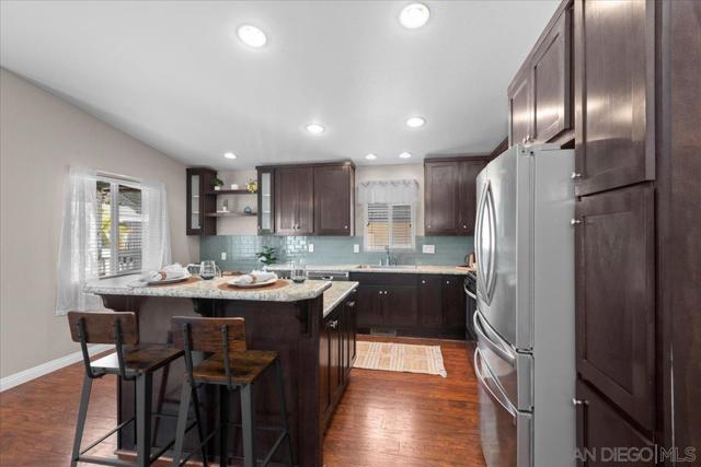 809 Discovery St, San Marcos CA: https://media.crmls.org/mediaz/08a07694-e648-49e6-b1e5-379a8feb6b22.jpg
