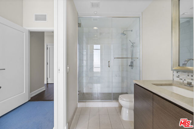 900 W Olympic Boulevard, Los Angeles CA: https://media.crmls.org/mediaz/090549e5-dd0a-464d-8795-04af1a66fedf.jpg