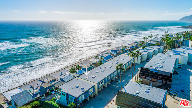 Enjoy beautiful ocean views from this nicely updated, light and bright ocean front townhome close to iconic surf spot "County Line"!  Lower floor has been re-configured for increased usable space. Gated complex boasts both a pool/spa and paddle tennis court and semi private beach.  This idyllic beach getaway has it all.