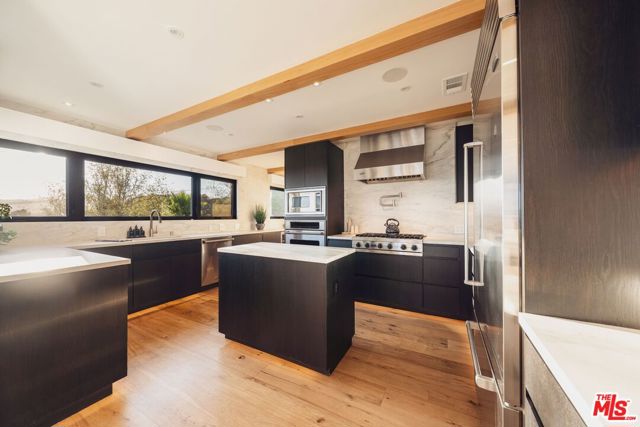 Drew Fenton | 1235 N Kenter Avenue Los Angeles CA | MLS: 7439365