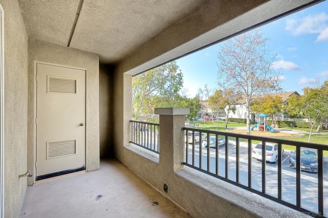 Soacious balcony overlooping the neighborhood park. The closet contains some storage and a brand new water heater.